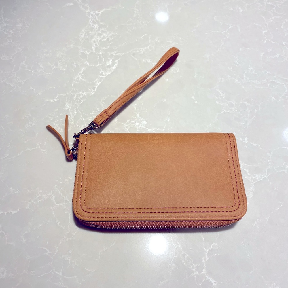 Like new tan wristlet!